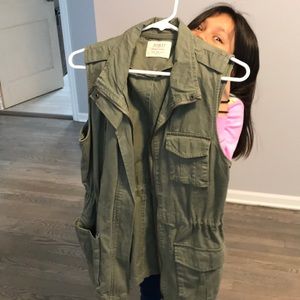 Green army vest (don’t mind my little helper lol)